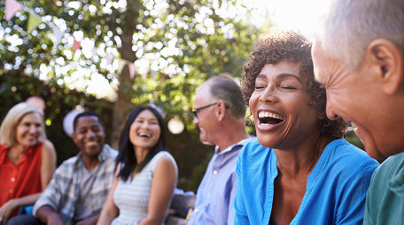 group of members smiling at bbq